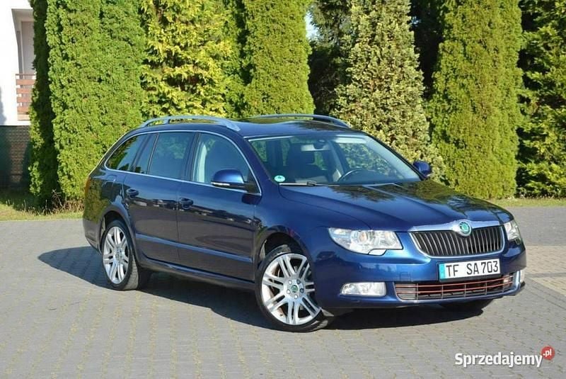 Czerwony Używany 2011 Skoda Superb Kombi | 27 900 zł (Uczciwa cena) - Obraz 1/4