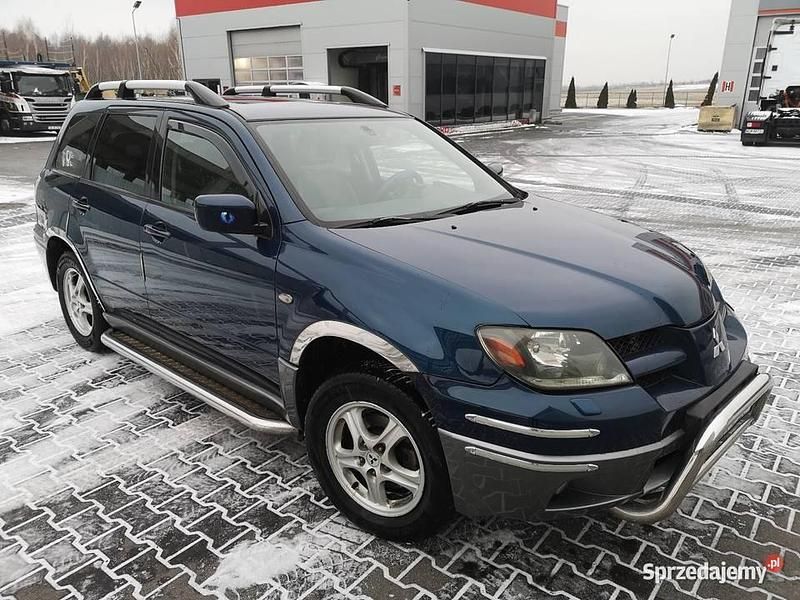 Niebieski Używany 2004 Mitsubishi Outlander SUV | 10 800 zł - Obraz 1/4