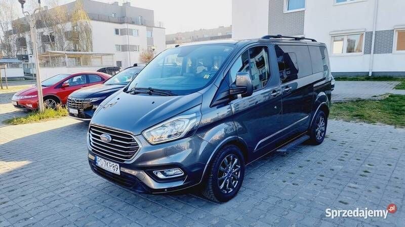 Grafitowy Używany 2018 Ford Tourneo Custom Titanium X Minivan | 100 997 zł (Uczciwa cena) - Obraz 1/4