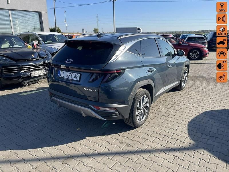 Grafitowy (metalik, perła) Używany 2022 Hyundai Tucson SUV | 62 900 zł - Obraz 1/4