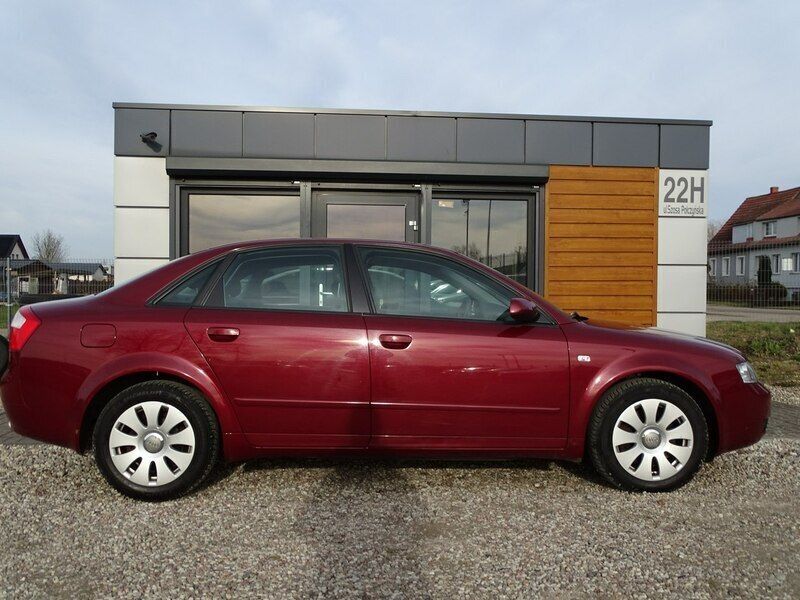 Używany Audi A4 150 KM (110 kW) 2004 Bordowy (metalik) Sedan/Limuzyna