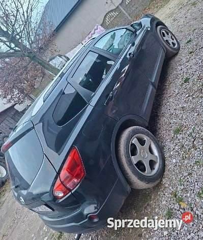 Używany Nissan Qashqai +2 140 KM (102 kW) 2009 Czarny SUV