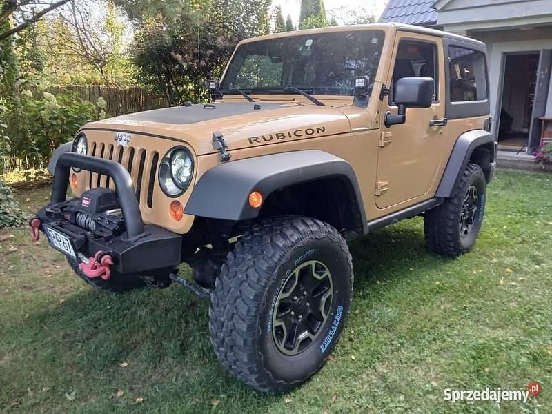 Żółty Używany 2013 Jeep Wrangler Rubicon SUV | 110 000 zł (Uczciwa cena) - Obraz 1/4