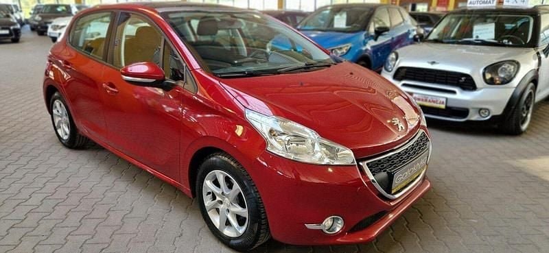 Czerwony Używany 2014 Peugeot 208 Hatchback | 24 900 zł (Uczciwa cena) - Obraz 1/4