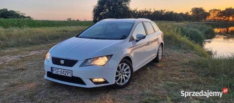 Biały Używany 2014 Seat Leon ST Kombi | 29 500 zł - Obraz 1/4