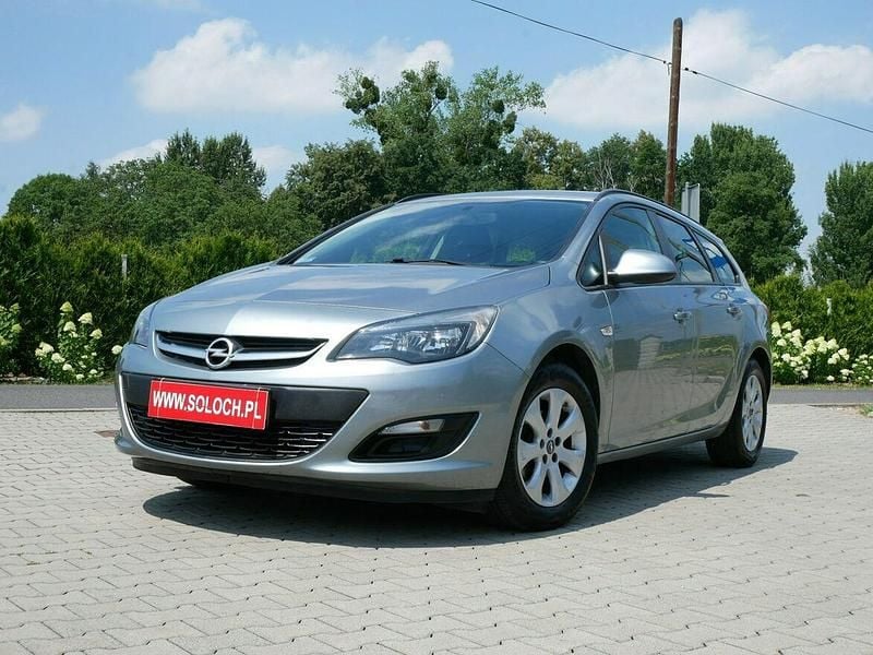 Używany Opel Astra Enjoy 100 KM (73 kW) 2014 Szary Kombi