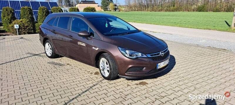 Brązowy Używany 2016 Opel Astra Kombi | 35 000 zł (Dość drogi) - Obraz 1/4