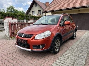 Pomarańczowy Używany 2006 Suzuki SX4 Hatchback | 12 900 zł - Obraz 1/4
