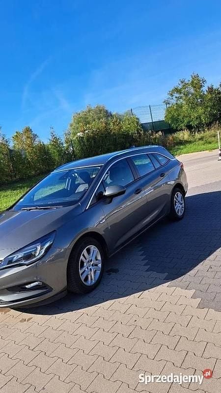 Szary Używany 2016 Opel Astra Kombi | 27 500 zł - Obraz 1/4