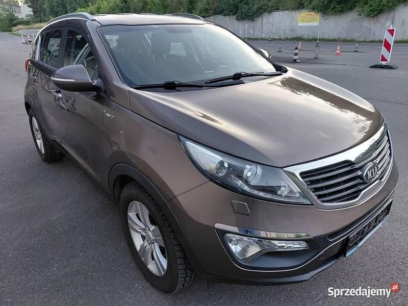 Brązowy Używany 2013 Kia Sportage SUV | 41 700 zł (Uczciwa cena) - Obraz 1/4