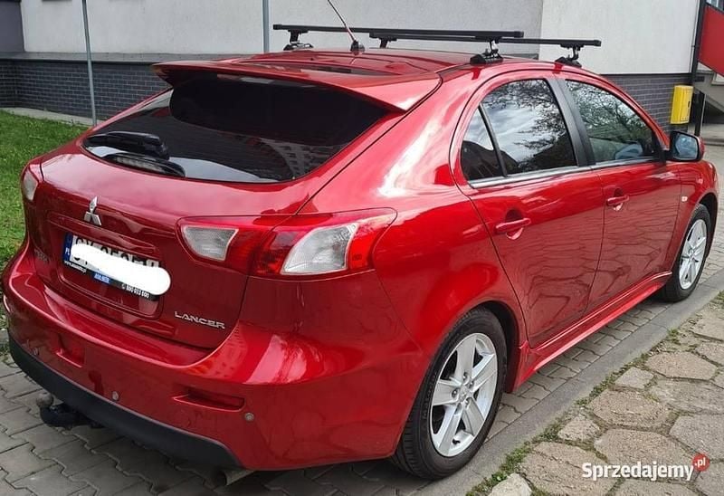 Czerwony Używany 2009 Mitsubishi Lancer Sportback Hatchback | 24 900 zł - Obraz 1/4