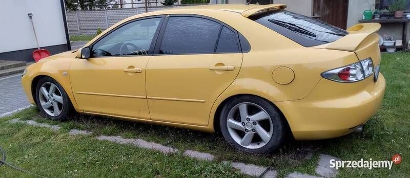 Żółty Używany 2003 Mazda 6 Inclusive Hatchback | 3000 zł - Obraz 1/4