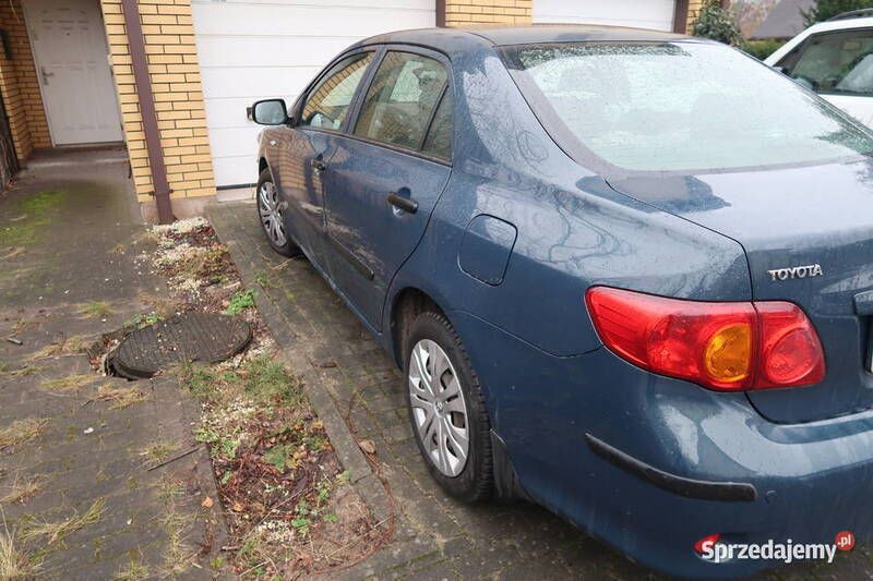 Używany Toyota Corolla 124 KM (91 kW) 2007 Granatowy Sedan/Limuzyna