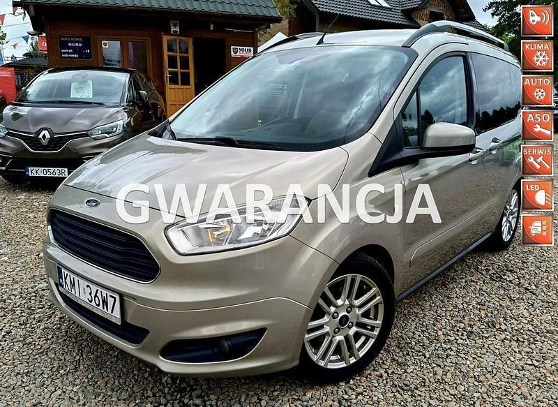 Złoty (metalik) Używany 2014 Ford Tourneo Courier Minivan | 27 900 zł (Uczciwa cena) - Obraz 1/4