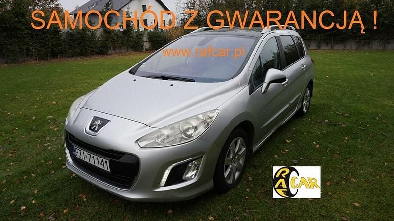 Używany Peugeot 308 SW 112 KM (82 kW) 2012 Srebrny (metalik) Kombi