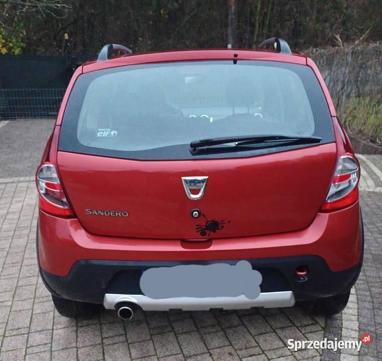 Czerwony Używany 2012 Dacia Sandero Hatchback | 12 000 zł - Obraz 1/4