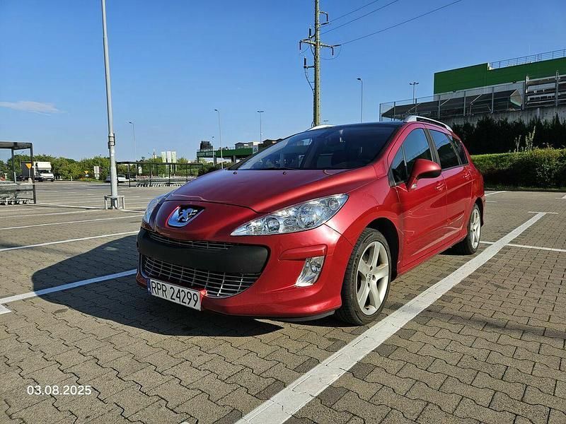 Czerwony Używany 2008 Peugeot 308 SW Premium Kombi | 9900 zł - Obraz 1/4