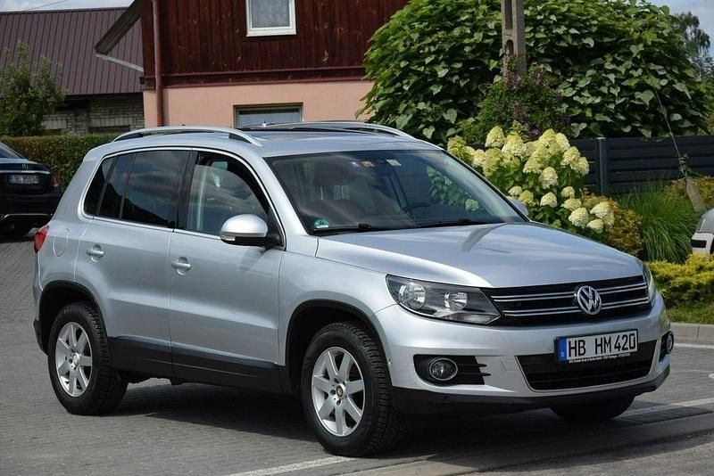 Srebrny (metalik) Używany 2012 VW Tiguan SUV | 41 900 zł (Uczciwa cena) - Obraz 1/4
