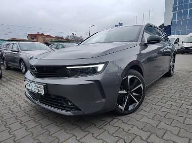 Szary Używany 2023 Opel Astra Elegance Kombi | 89 900 zł - Obraz 1/4