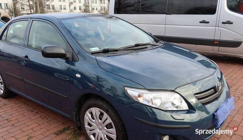 Używany Toyota Corolla 124 KM (91 kW) 2007 Granatowy Sedan/Limuzyna