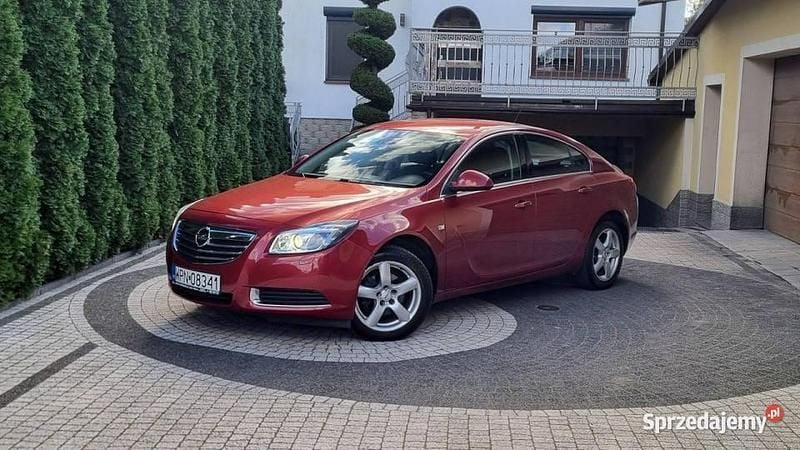 Używany Opel Insignia 130 KM (95 kW) 2009 Bordowy (metalik) Sedan/Limuzyna