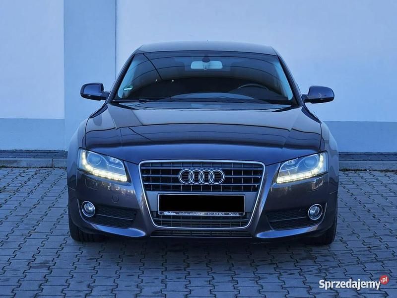 Fioletowy (metalik, perła) Używany 2010 Audi A5 Hatchback | 38 456 zł (Drogi) - Obraz 1/4