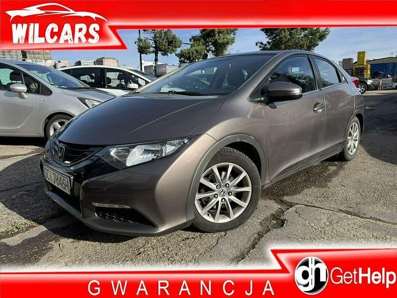 Szary (metalik) Używany 2012 Honda Civic Hatchback | 32 000 zł (Uczciwa cena) - Obraz 1/4