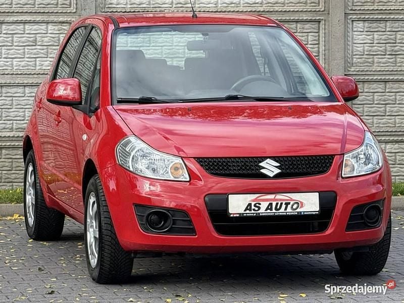 Czerwony Używany 2010 Suzuki SX4 Hatchback | 23 900 zł (Drogi) - Obraz 1/4