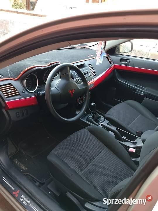 Używany Mitsubishi Lancer 109 KM (80 kW) 2010 Zielony Sedan/Limuzyna