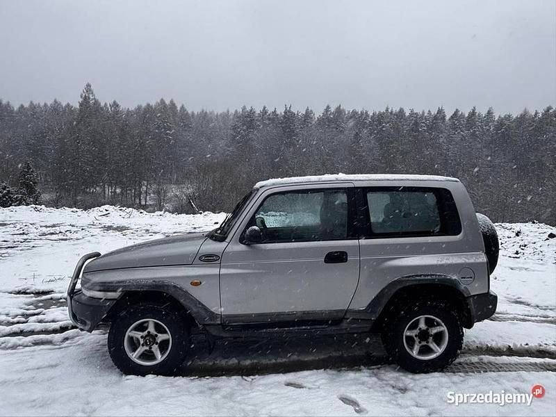 Szary Używany 2001 Ssangyong (KGM) Korando SUV | 14 500 zł - Obraz 1/4