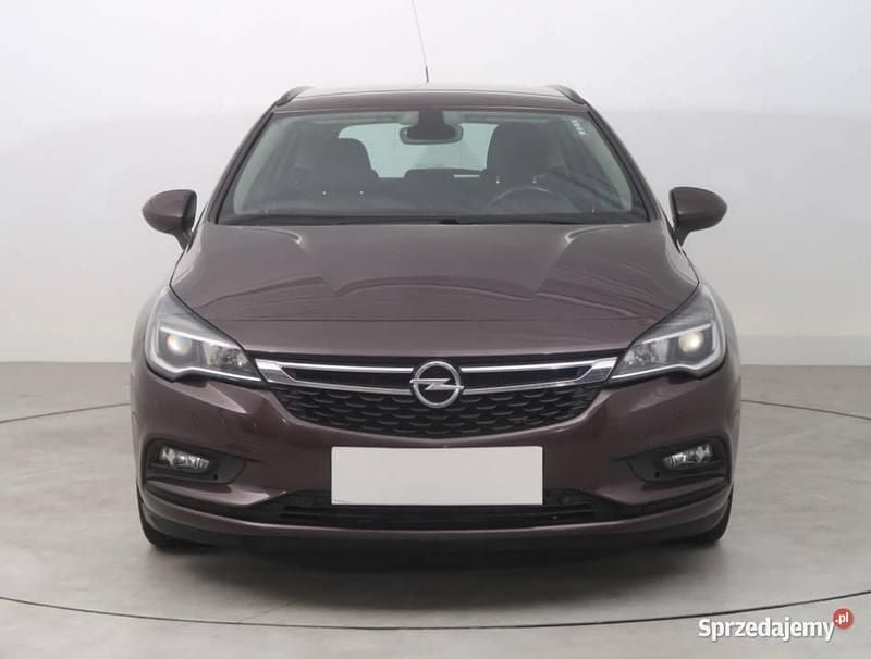 Brązowy Używany 2017 Opel Astra Kombi | 38 999 zł (Uczciwa cena) - Obraz 1/4