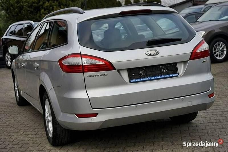 Używany Ford Mondeo 115 KM (84 kW) 2010 Srebrny Kombi