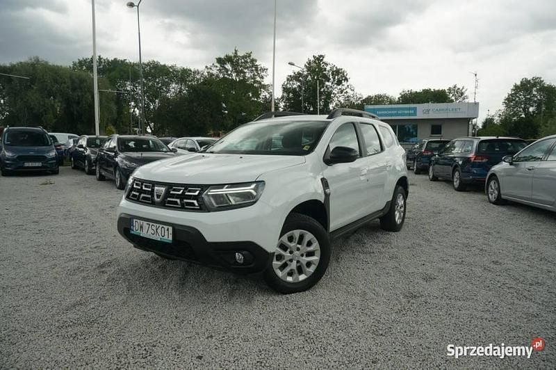 Biały Używany 2022 Dacia Duster Comfort SUV | 56 300 zł (Uczciwa cena) - Obraz 1/4