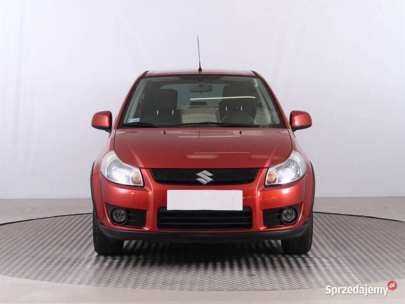 Pomarańczowy Używany 2009 Suzuki SX4 Hatchback | 26 999 zł (Dość drogi) - Obraz 1/4