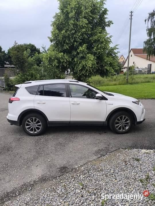 Biały Używany 2018 Toyota RAV4 Hybrid SUV | 75 800 zł - Obraz 1/4