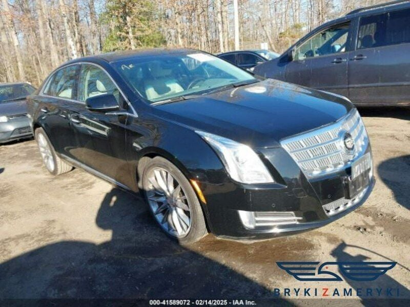Czarny Używany 2013 Cadillac XTS Sedan/Limuzyna | 34 620 zł - Obraz 1/3