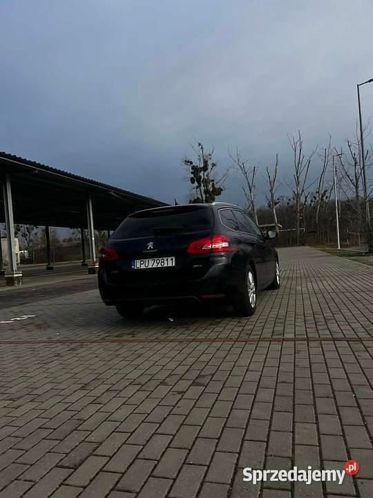 Używany Peugeot 308 SW 2014 Niebieski Kombi