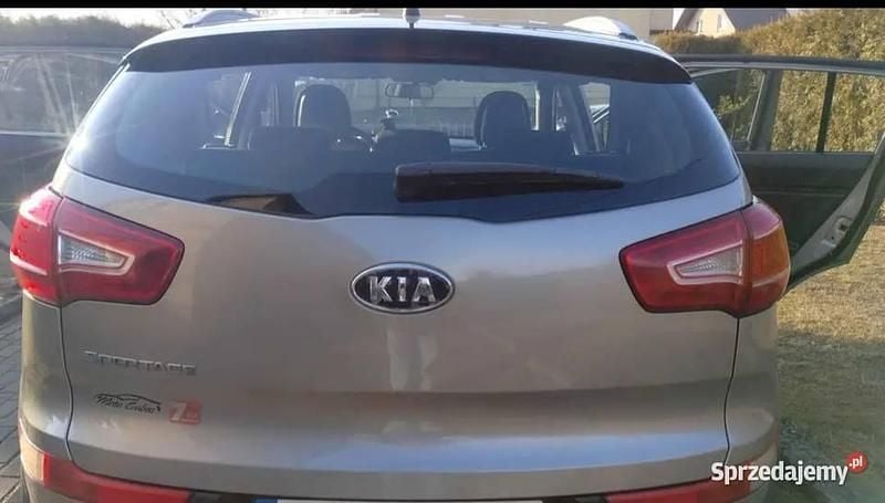 Złoty Używany 2011 Kia Sportage SUV | 31 000 zł (Uczciwa cena) - Obraz 1/3