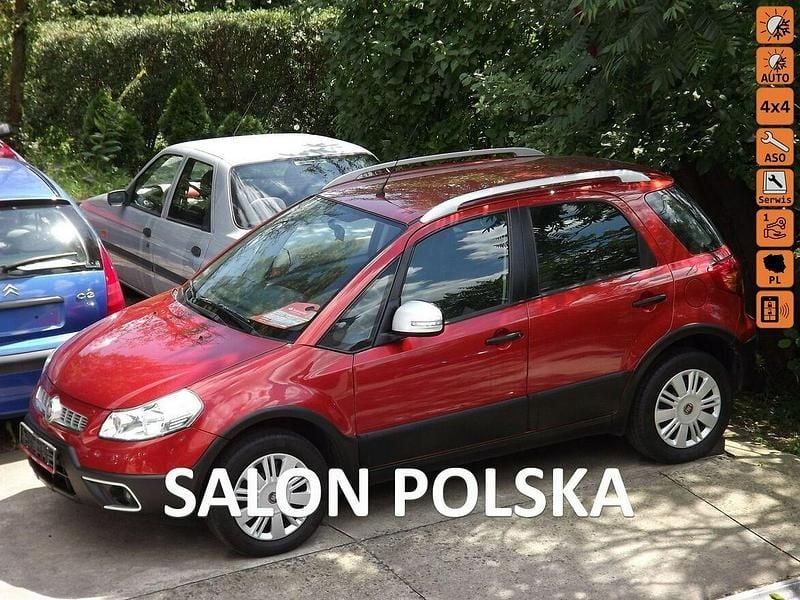 Pomarańczowy (metalik, perła) Używany 2014 Fiat Sedici SUV | 39 800 zł (Drogi) - Obraz 1/4