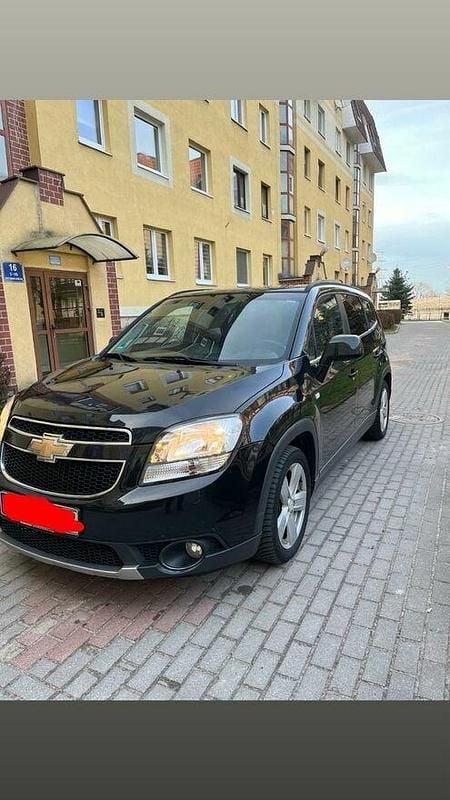 Czarny Używany 2011 Chevrolet Orlando Minivan | 19 900 zł (Uczciwa cena) - Obraz 1/4