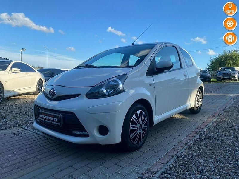Biały Używany 2012 Toyota Aygo Hatchback | 13 999 zł (Uczciwa cena) - Obraz 1/4