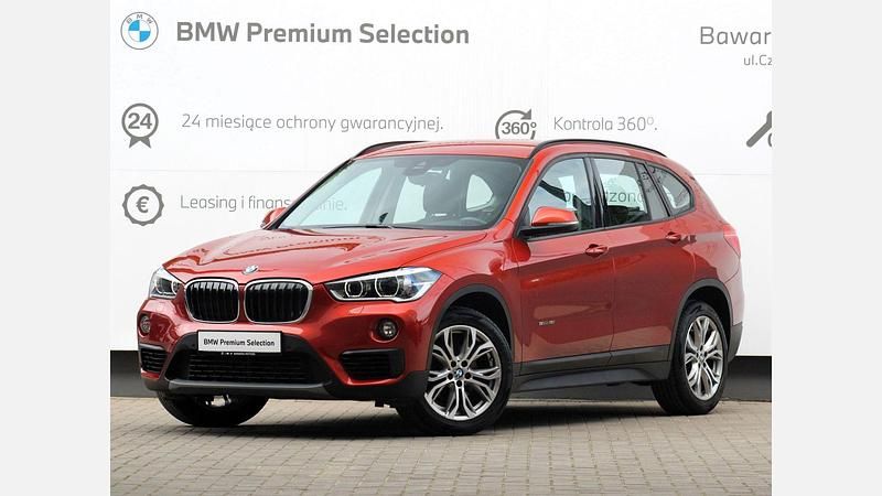 Sunset orange metallic metalizowany Używany 2018 BMW X1 Advantage SUV | 79 900 zł (Uczciwa cena) - Obraz 1/3
