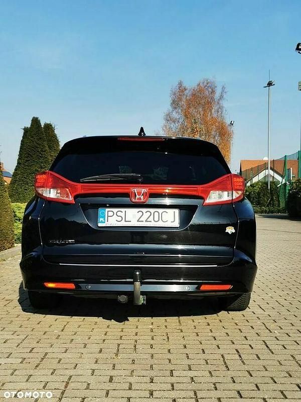 Używany Honda Civic Elegance 120 KM (88 kW) 2014 Czarny Kombi