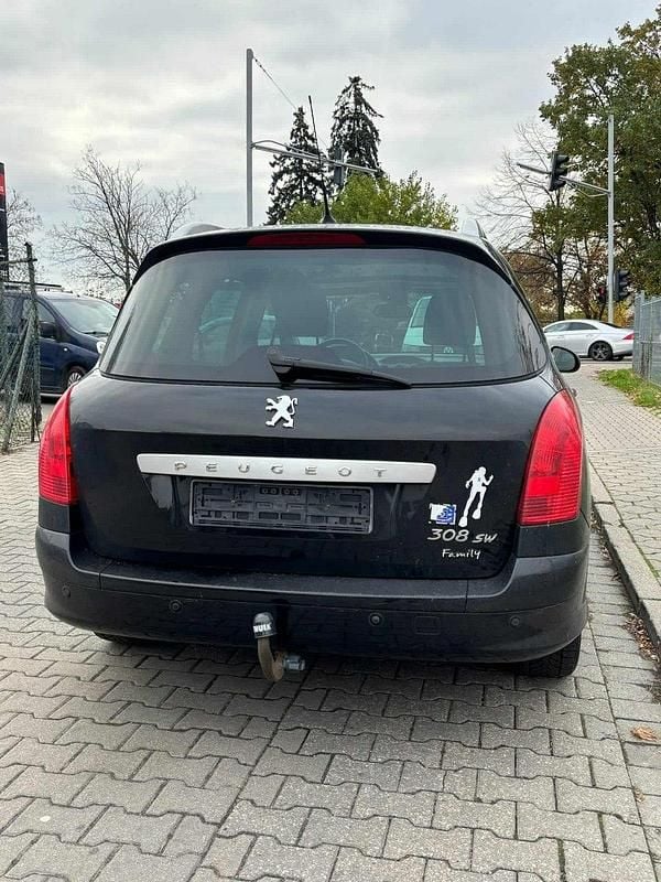 Używany Peugeot 308 SW 140 KM (102 kW) 2012 Czarny (metalik) Kombi