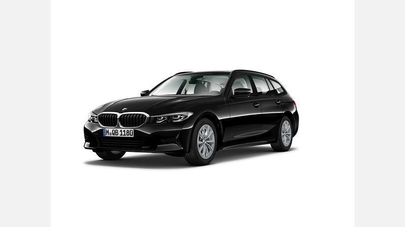 Czarny szafir metalizowany Używany 2021 BMW 320 Advantage Kombi | 104 900 zł (Dobra cena) - Obraz 1/3