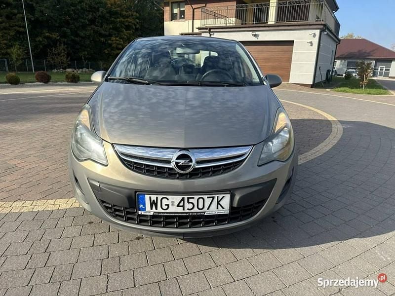 Używany Opel Corsa 90 KM (66 kW) 2012 Brązowy Hatchback