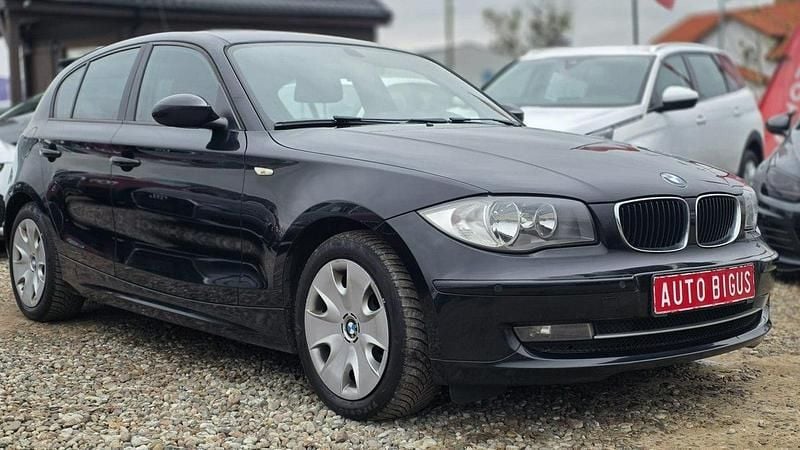 Używany BMW 116 122 KM (89 kW) 2009 Czarny (metalik) Hatchback