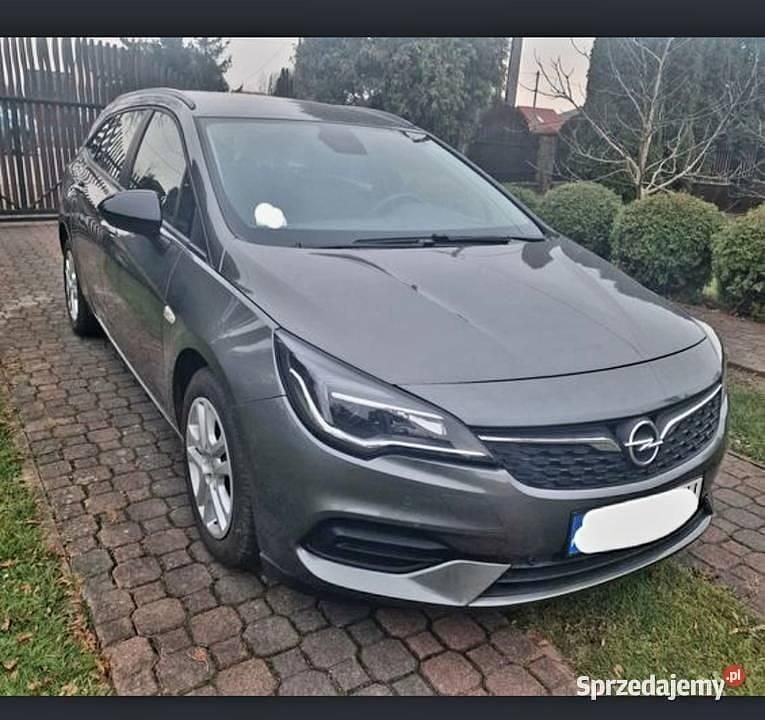 Szary Używany 2021 Opel Astra Kombi | 48 500 zł (Uczciwa cena) - Obraz 1/4