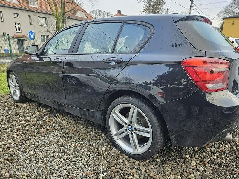 Używany BMW 116 Sport Line 136 KM (100 kW) 2012 Czarny (metalik) Hatchback