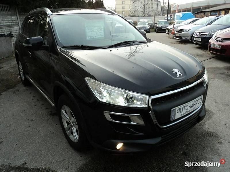 Czarny (metalik) Używany 2015 Peugeot 4008 SUV | 40 600 zł - Obraz 1/4